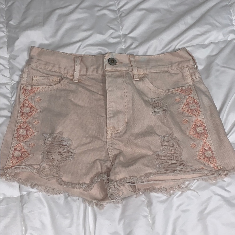 Peach/light pink ripped jean shorts